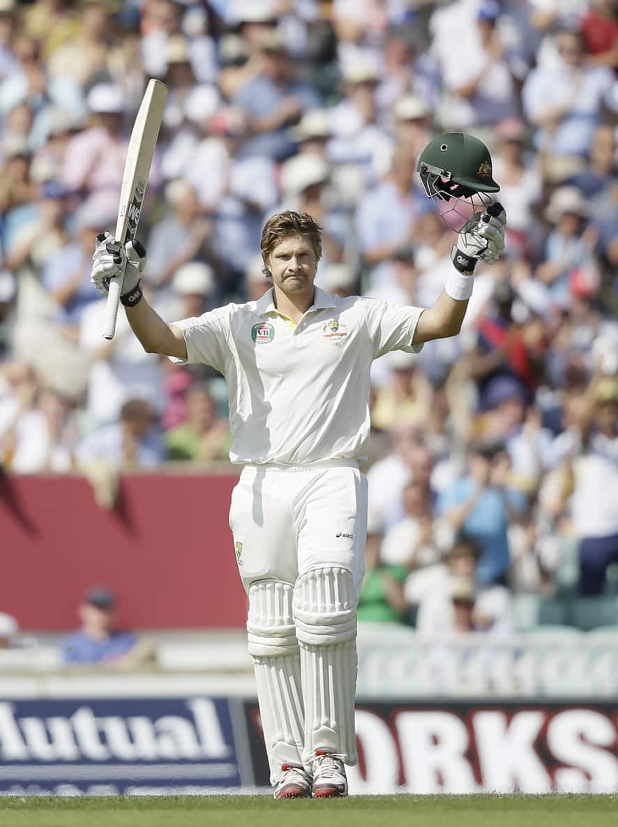 Australia's Shane Watson celebrates scoring 100 runs not out against England during play on the first day of the fifth Ashes cricket Test at the Oval cricket ground in London.