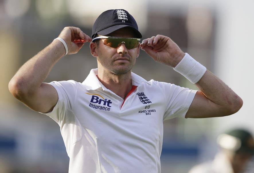 England's James Anderson adjusts his sunglasses as he leaves the pitch at the end of the first days play against Australia in the fifth Ashes cricket Test at the Oval cricket ground in London.