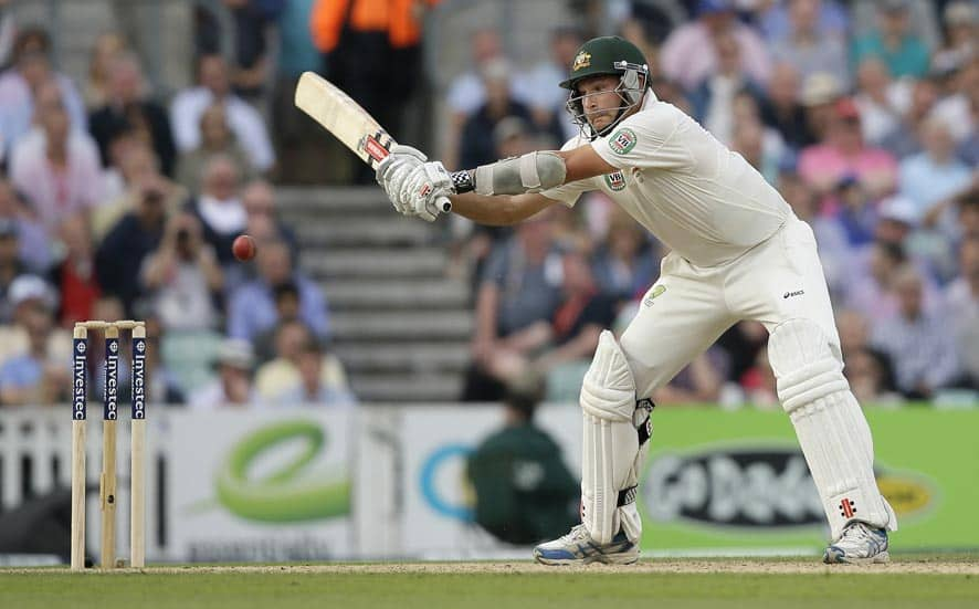 Australia's Ryan Harris stretches to play a shot and misses the ball from the bowling of England's James Anderson during play on the second day of the fifth Ashes cricket Test at the Oval cricket ground in London