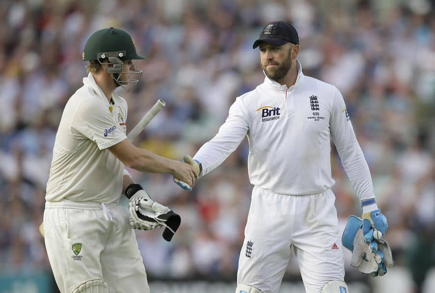 England's wicketkeeper Matt Prior, right, shakes hands with Australia's Steven Smith as Australia declare their first innings on 492 for 9, with Smith unbeaten on 138, during play on the second day of the fifth Ashes cricket Test at the Oval cricket ground in London.