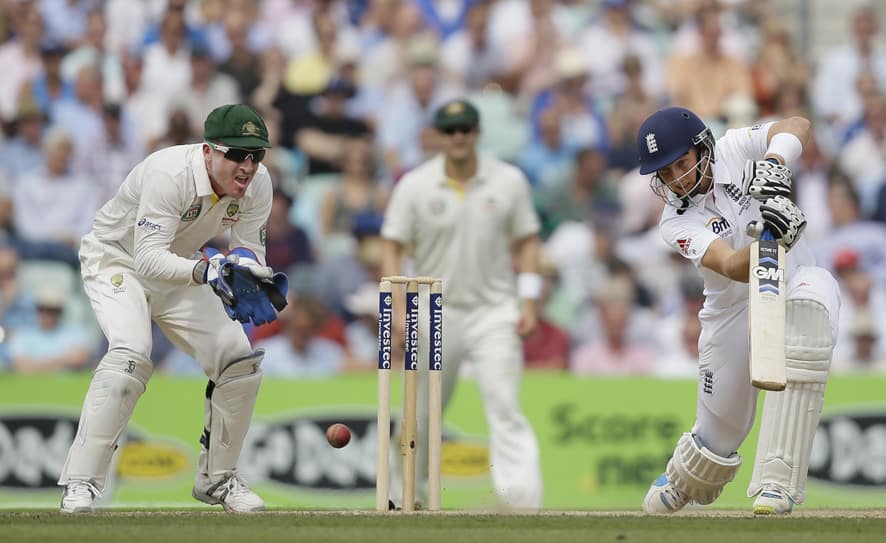 England's Joe Root plays a shot from the bowling of Australia's Nathan Lyon during play on the third day of the fifth Ashes cricket Test at the Oval cricket ground in London.