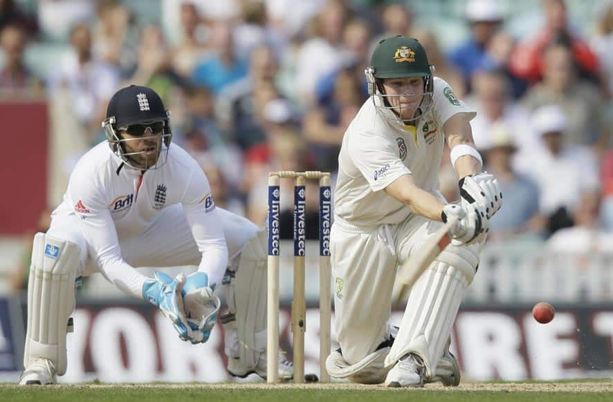 Australia's Steven Smith plays a shot off the bowling of England's Graeme Swann during play on the fifth day of the fifth Ashes cricket Test at the Oval cricket ground in London.