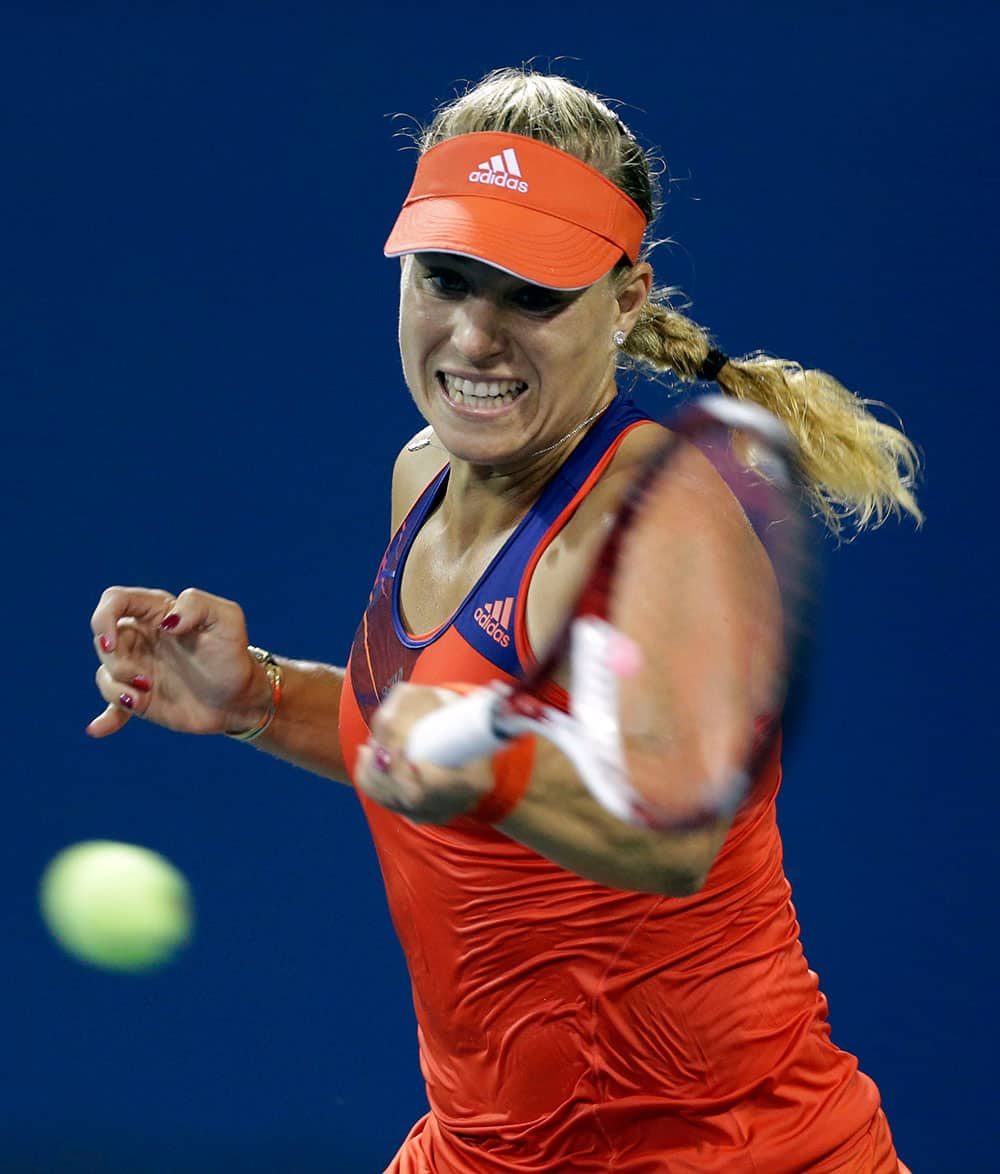 Angelique Kerber, of Germany, returns a shot to Czech Republic's Lucie Hradecka during the opening round of the US Open tennis tournament.