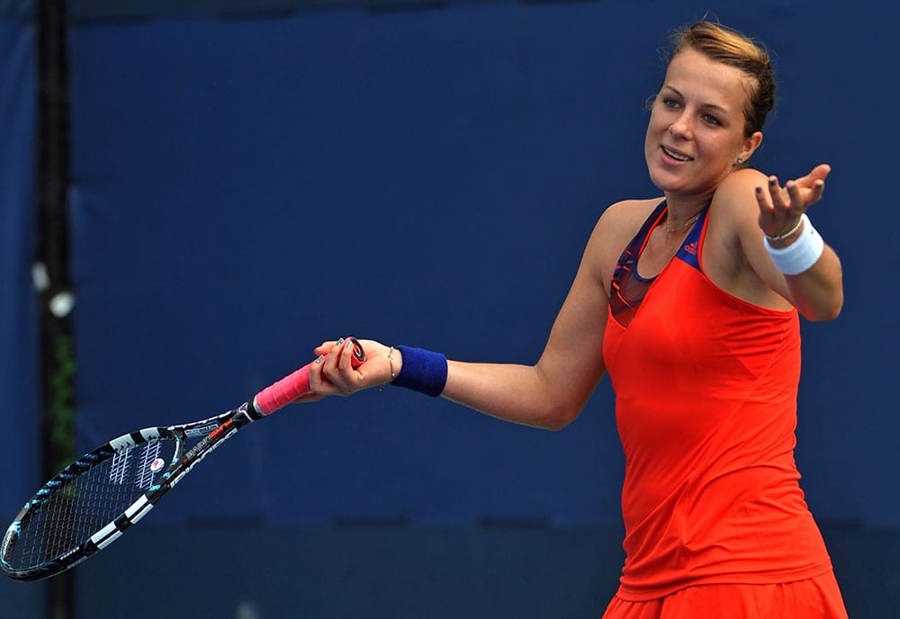 Anastasia Pavlyuchenkova, of Russia, gestures during her match against France's Virginie Razzano in the first round of the 2013 US Open tennis tournament.