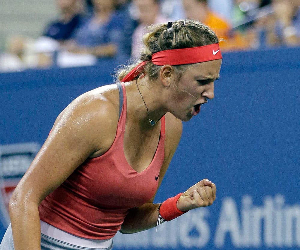 Belarus's Victoria Azarenka reacts during her match against Germany's Dinah Pfizenmaier in the first round of the US Open tennis tournament.