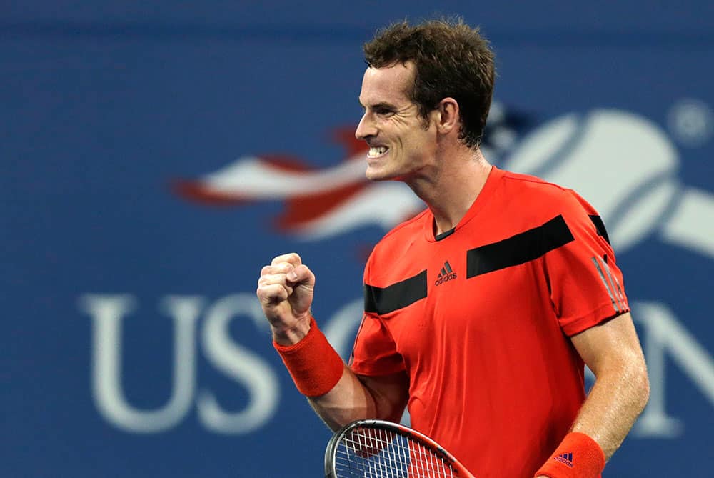 Andy Murray, of Britain, pumps his fist after winning a point against Michael Llodra, of France, during the first round of the 2013 US Open tennis tournament.