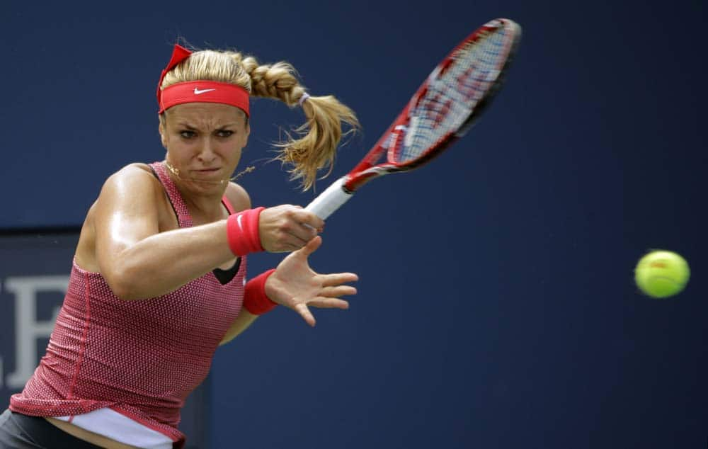 Sabine Lisicki, of Germany, returns a shot to Paula Ormaechea, of Argentina, during the second round of the 2013 US Open tennis tournament.