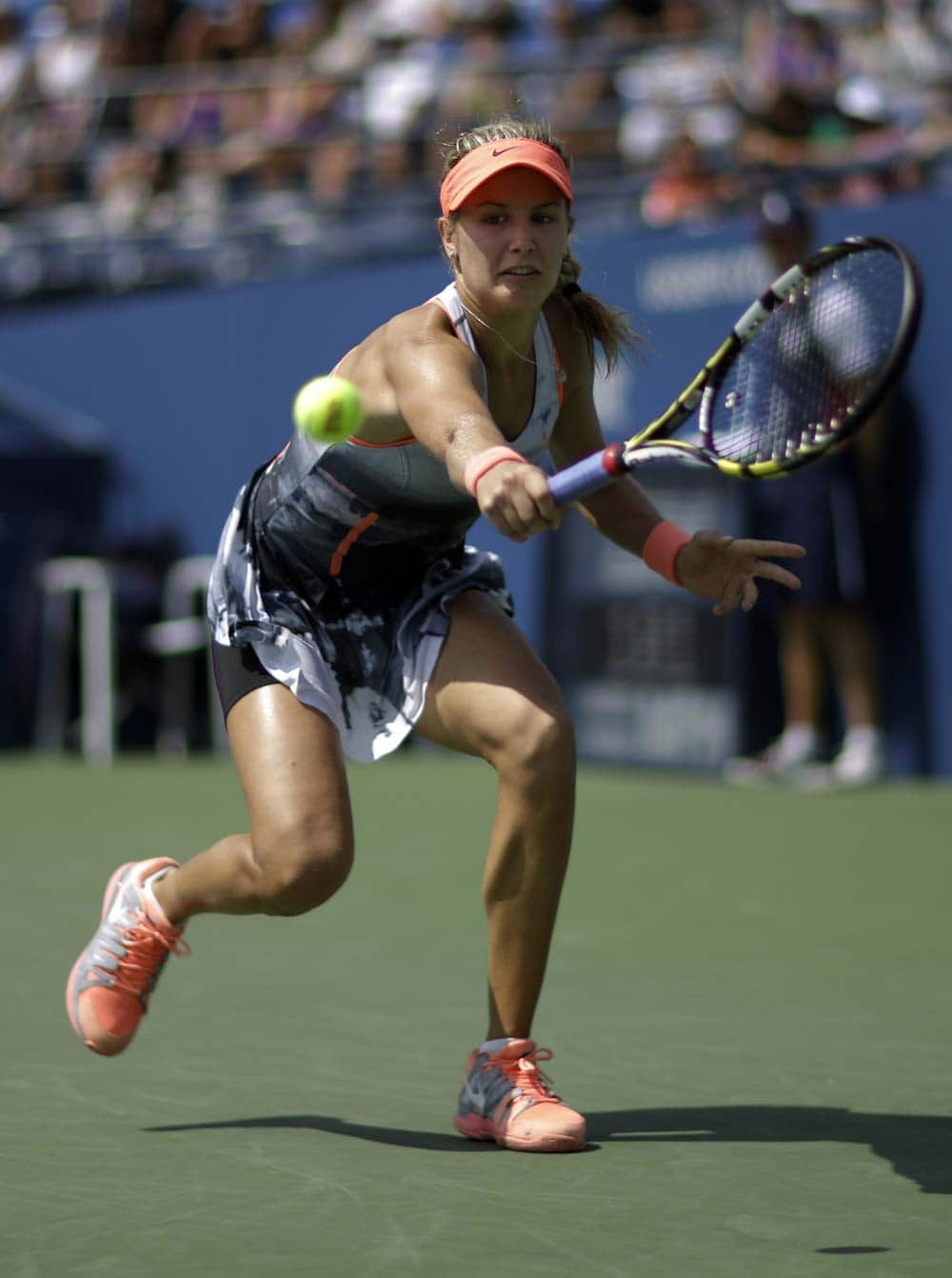 Eugenie Bouchard, of Canada, returns a shot to Angelique Kerber, of Germany, during the second round of the 2013 US Open tennis tournament.