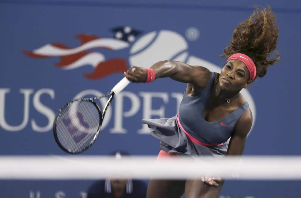 Serena Williams, of the United States, serves to Yaroslava Shvedova, of Kazakhstan, during the third round of the 2013 US Open tennis tournament.