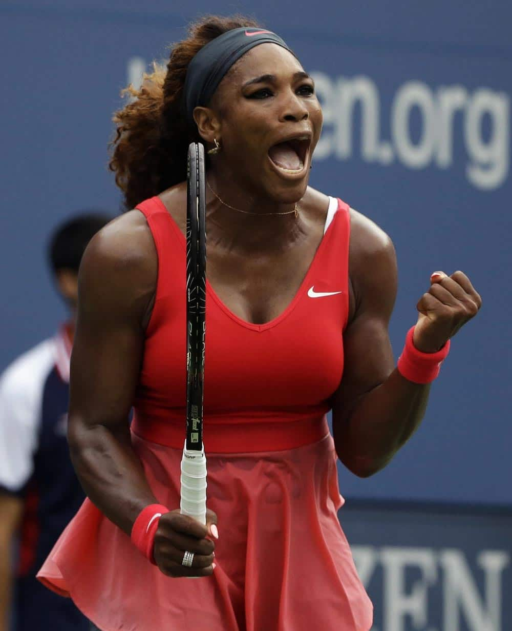 Serena Williams reacts after a point against Sloane Stephens during the fourth round of the 2013 US Open tennis tournament.