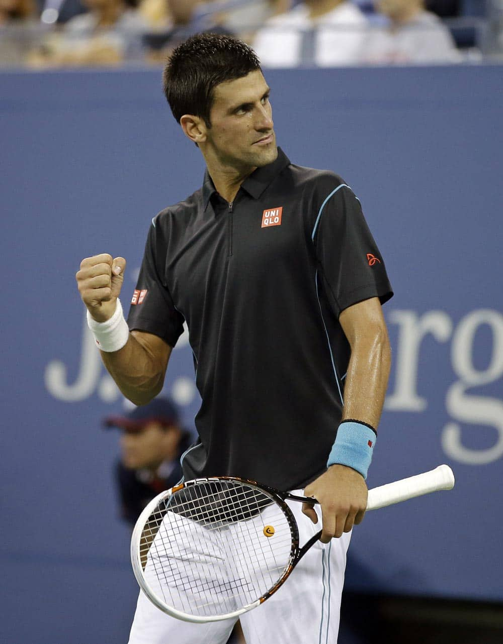 Novak Djokovic, of Serbia, reacts after defeating Joao Sousa, of Portugal, in a third round match at the US Open tennis tournament.