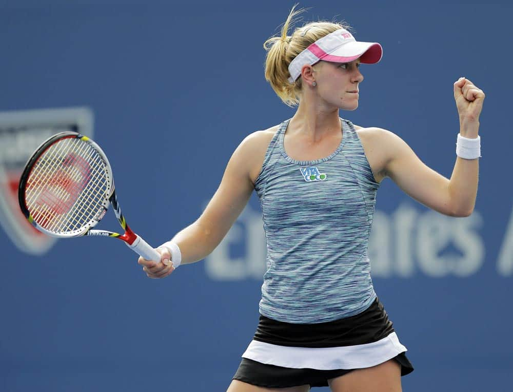 Alison Riske reacts after scoring a point during her match against Daniela Hantuchova, of Slovakia, during the fourth round of the 2013 US Open tennis tournament.