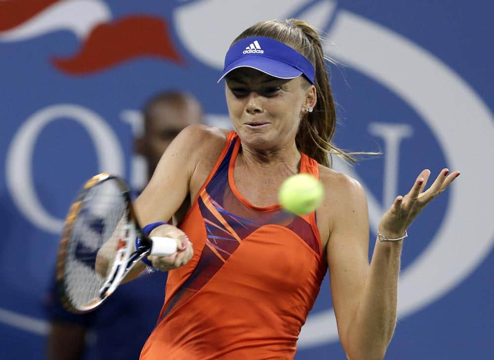 Daniela Hantuchova, of Slovakia, returns a shot to Victoria Azarenka, of Belarus, during a quarterfinal in the US Open tennis tournament.