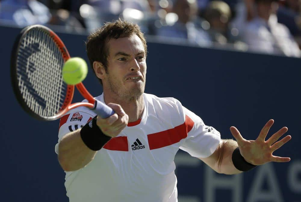 Andy Murray, of Great Britain, returns a shot to Stanislas Wawrinka, of Switzerland, during the quarterfinals of the 2013 US Open tennis tournament.