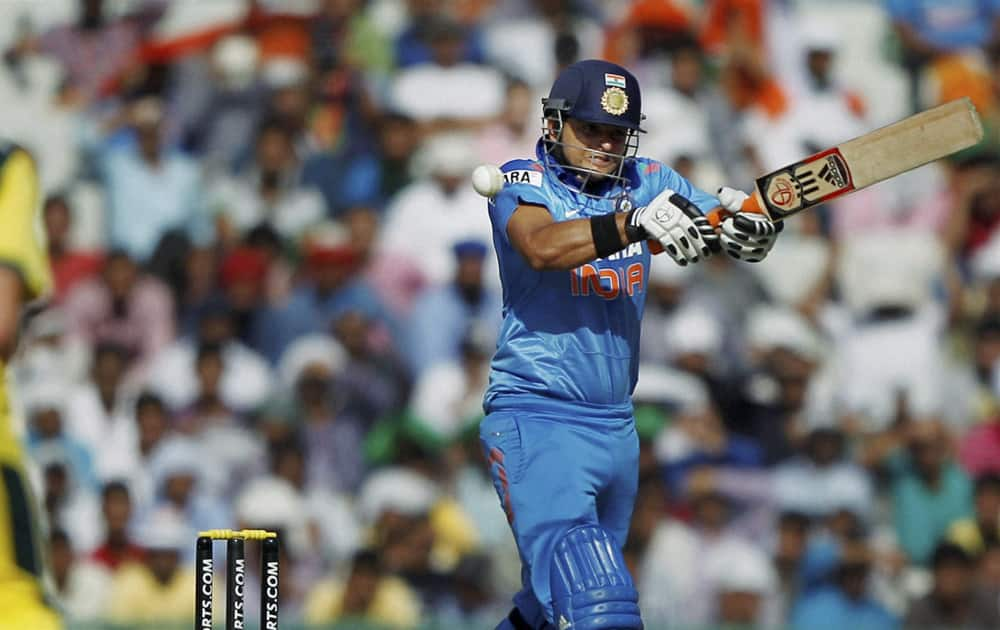 Suresh Raina edges a delivery for his dismissal during the 3rd ODI against Australia at PCA stadium in Mohali.