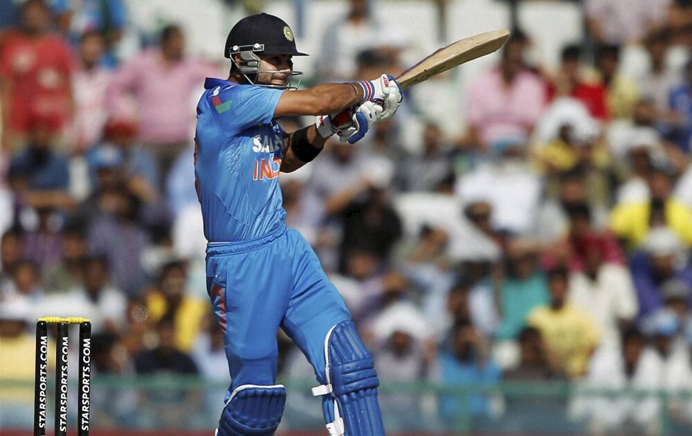 Virat Kohli plays a shot during the 3rd ODI against Australia at PCA stadium in Mohali.