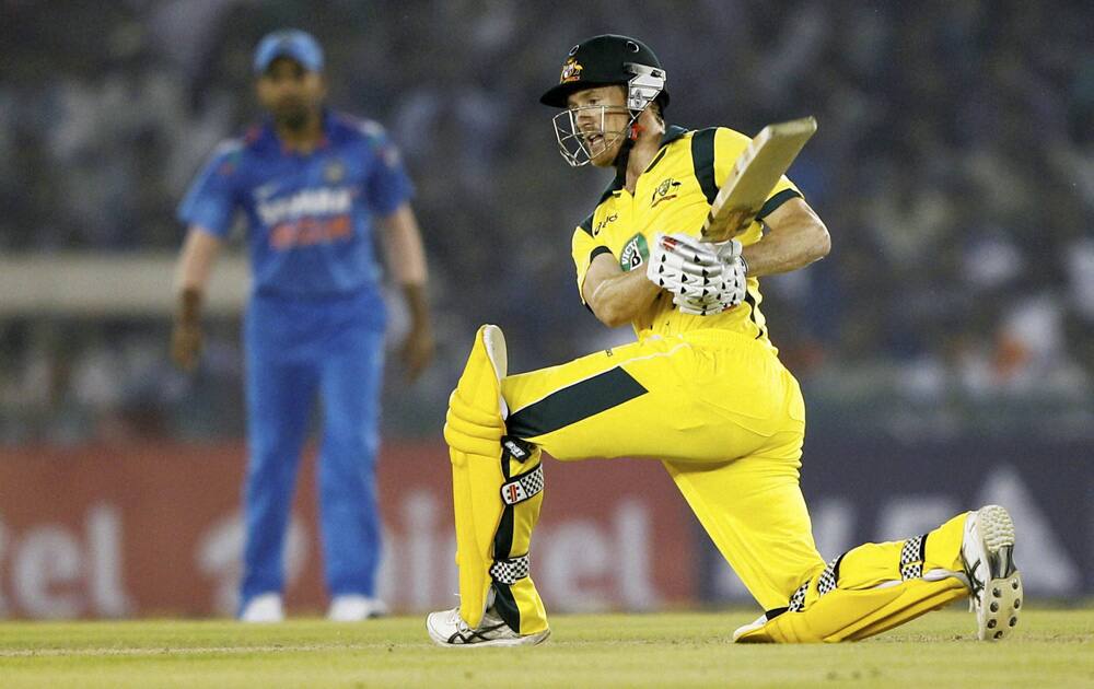 G Bailey plays a shot during the 3rd ODI against India at PCA stadium in Mohali.