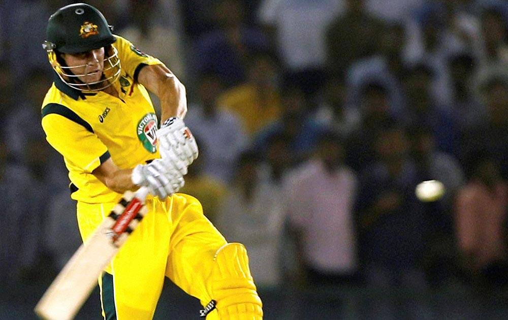 Australian batsman Faulkner plays a shot during the 3rd ODI against India at PCA stadium in Mohali.