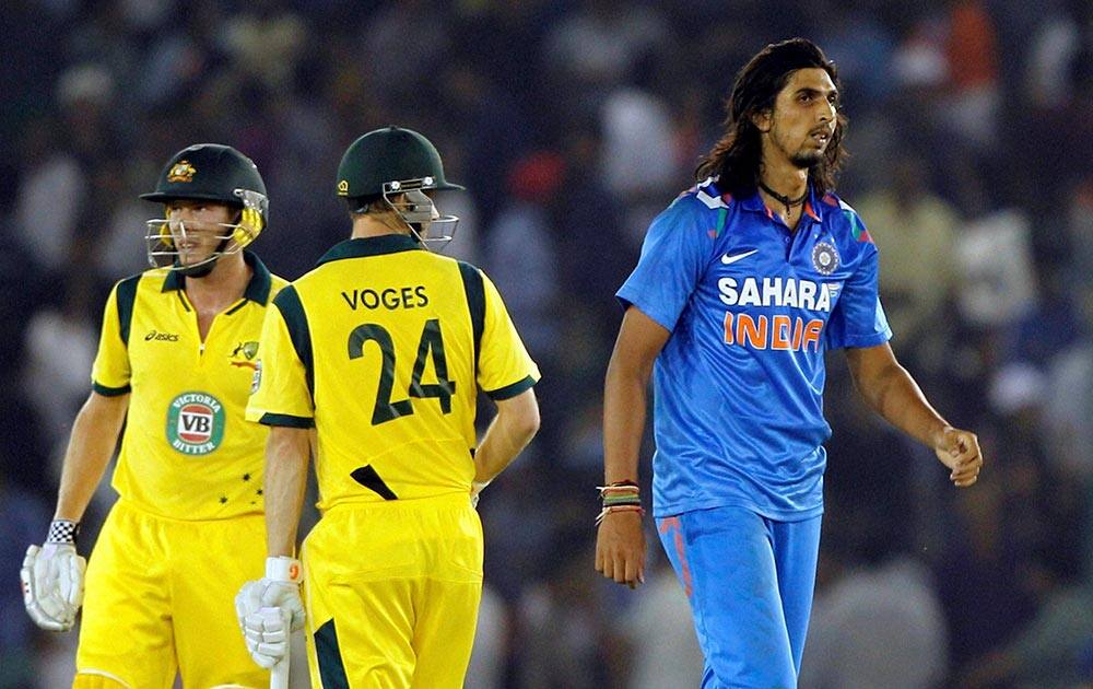 India's Ishant Sharma reacts after being trashed by Austrailian batsmen Faulkner and Voges during the 3rd ODI agianst Austrailia at PCA stadium in Mohali.