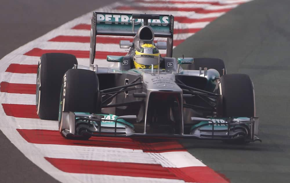 Mercedes driver Nico Rosberg of Germany steers his car during the first practice session at the Indian Formula One Grand Prix at the Buddh International Circuit in Noida.