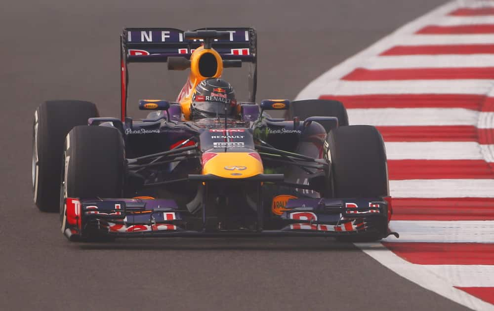 Red Bull driver Sebastian Vettel of Germany steers his car during the first practice session at the Indian Formula One Grand Prix at the Buddh International Circuit in Noida.