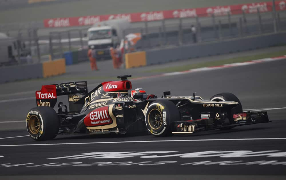 Lotus driver Kimi Raikkonen of Finland steers his car during the third practice session at the Indian Formula One Grand Prix at the Buddh International Circuit in Noida.