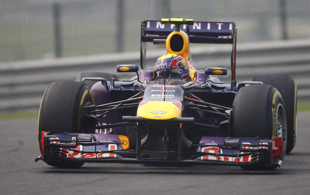 Red Bull driver Mark Webber of Australia steers his car during the third practice session at the Indian Formula One Grand Prix at the Buddh International Circuit in Noida.