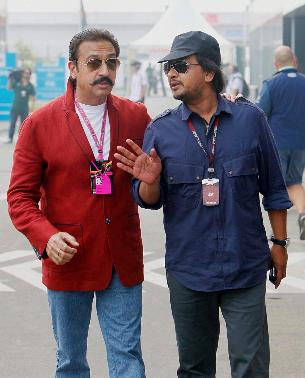 Actor Gulshan Grover with MD & CEO of Jaypee Sports Intetnational Ltd., Sameer Gaur during the Indian Formula One Grand Prix at the Buddh International Circuit in Greater Noida.