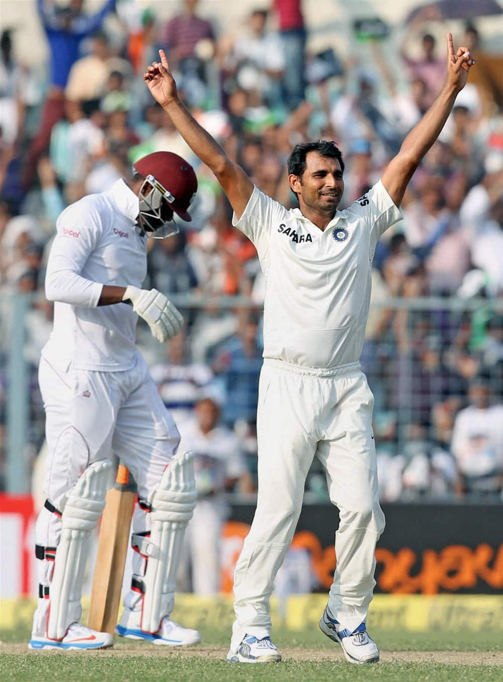 Mohammed Shami after taking the last wicket on the first day of the first test match between India and West Indies at Eden Garden in Kolkata.