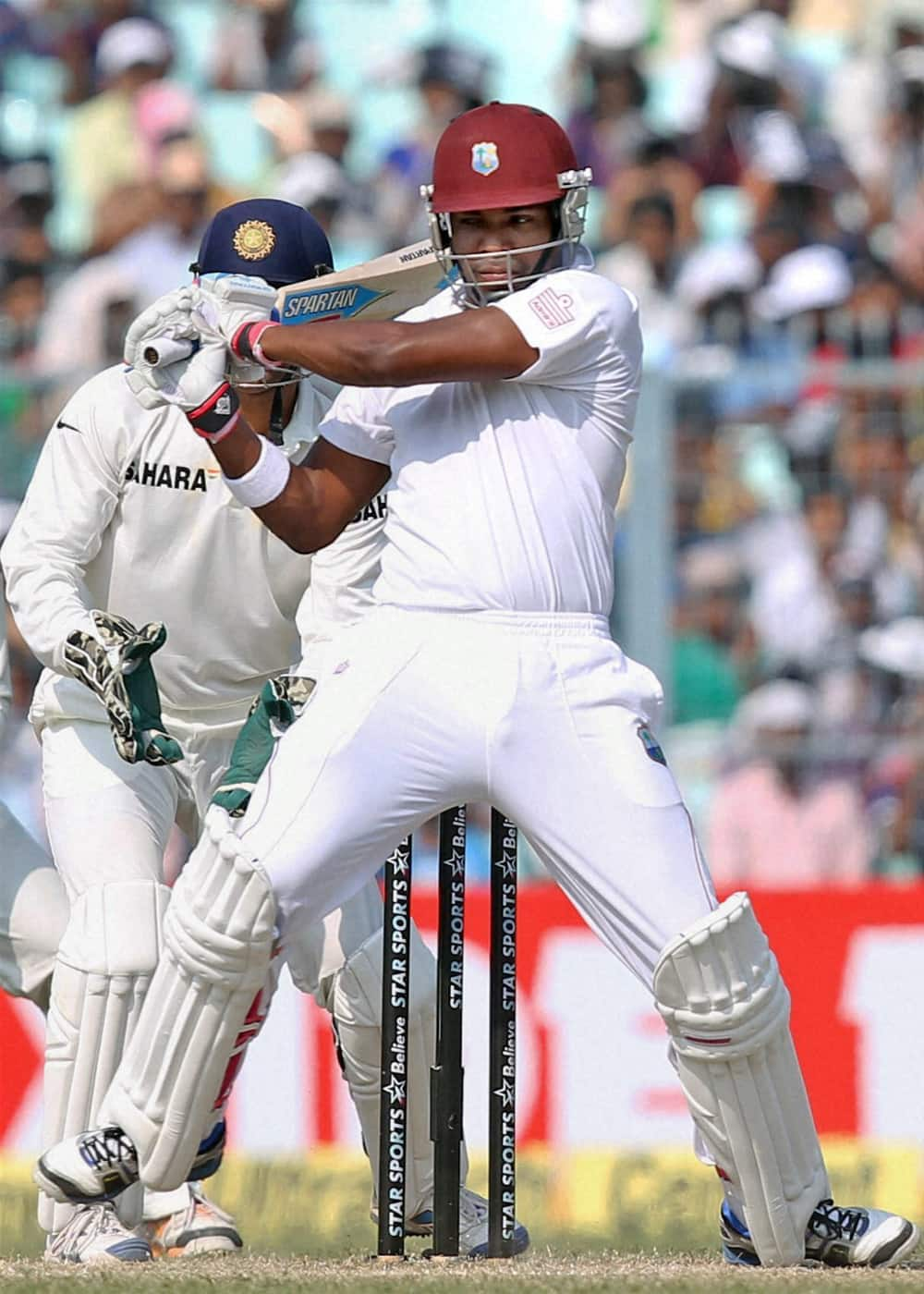 Kieran Powell plays a shot during 3rd day of the first test match against India at Eden Garden in Kolkata.