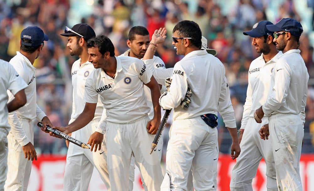 Indian players celebrates their win over West Indies in the first Test match at Eden Garden in Kolkata.