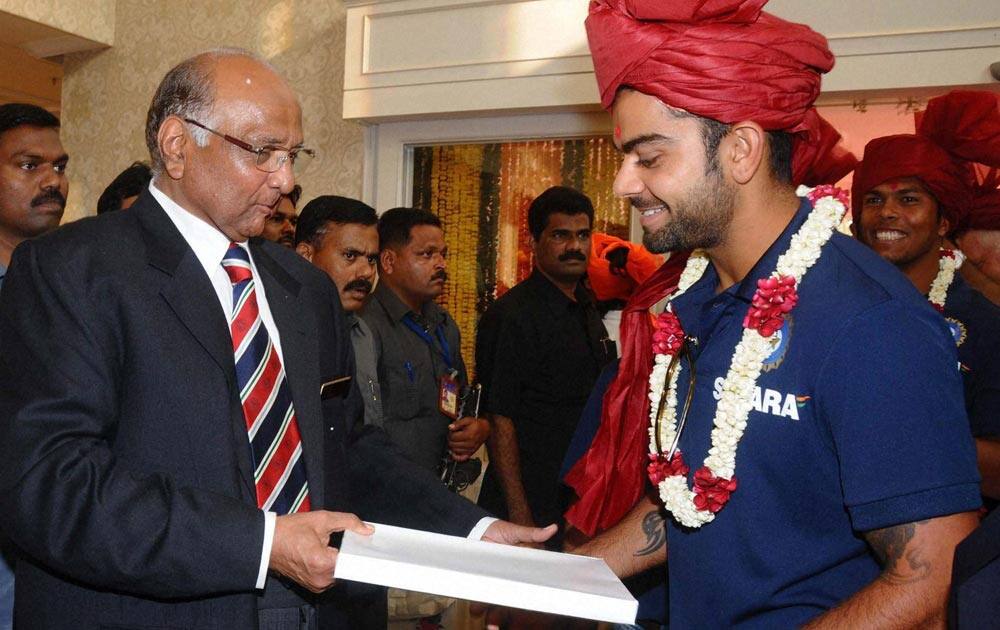 MCA, President Sharad Pawar(L) Virat Kohli during the Mumbai Cricket Association's Sachin Tendulkar Gymkhana naming function at Kandivali, North Mumbai.