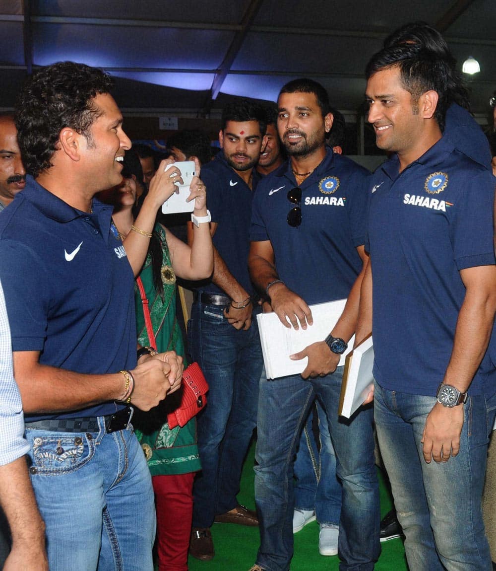 Sachin Tendulkar with MS Dhoni and other teammates during the Mumbai Cricket Association's Sachin Tendulkar Gymkhana naming function at Kandivali, North Mumbai.