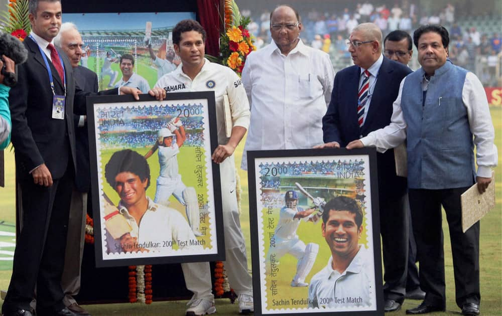 Union minister Kapil Sibal releasing special postal stamp of Sachin Tendulkar, with Mumbai Cricket Association chief Sharad Pawar, BCCI Chairman Srinivasan, BCCI Vice President Rajeev Shukla and Union minister of state for communications and information technology, Milind Deora at Wankhede stadium.