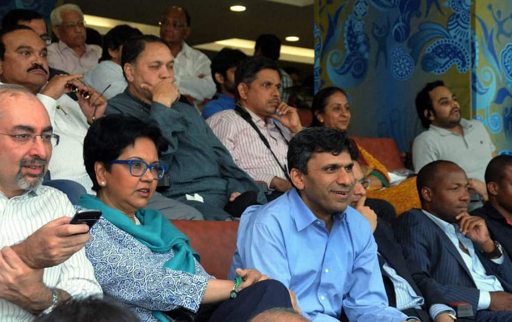 Pepsico CEO, Indra Nooyi (L) and Pravin Someshwar and Brian Lara during the India vs West Indies 2nd Test Match at Wankhede Stadium in Mumbai.