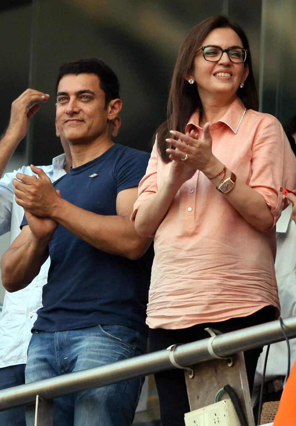 Aamir Khan and Neeta Ambani during the final Test match against West Indies at Wankhede Stadium in Mumbai.