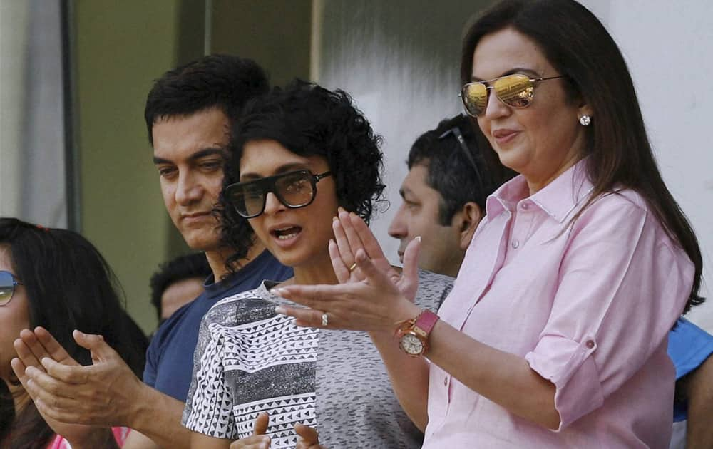 Nita Ambani, Kiran Rao and Aamir Khan at Wankhede Stadium on Day 2 of the final Test match between India and West Indies in Mumbai.