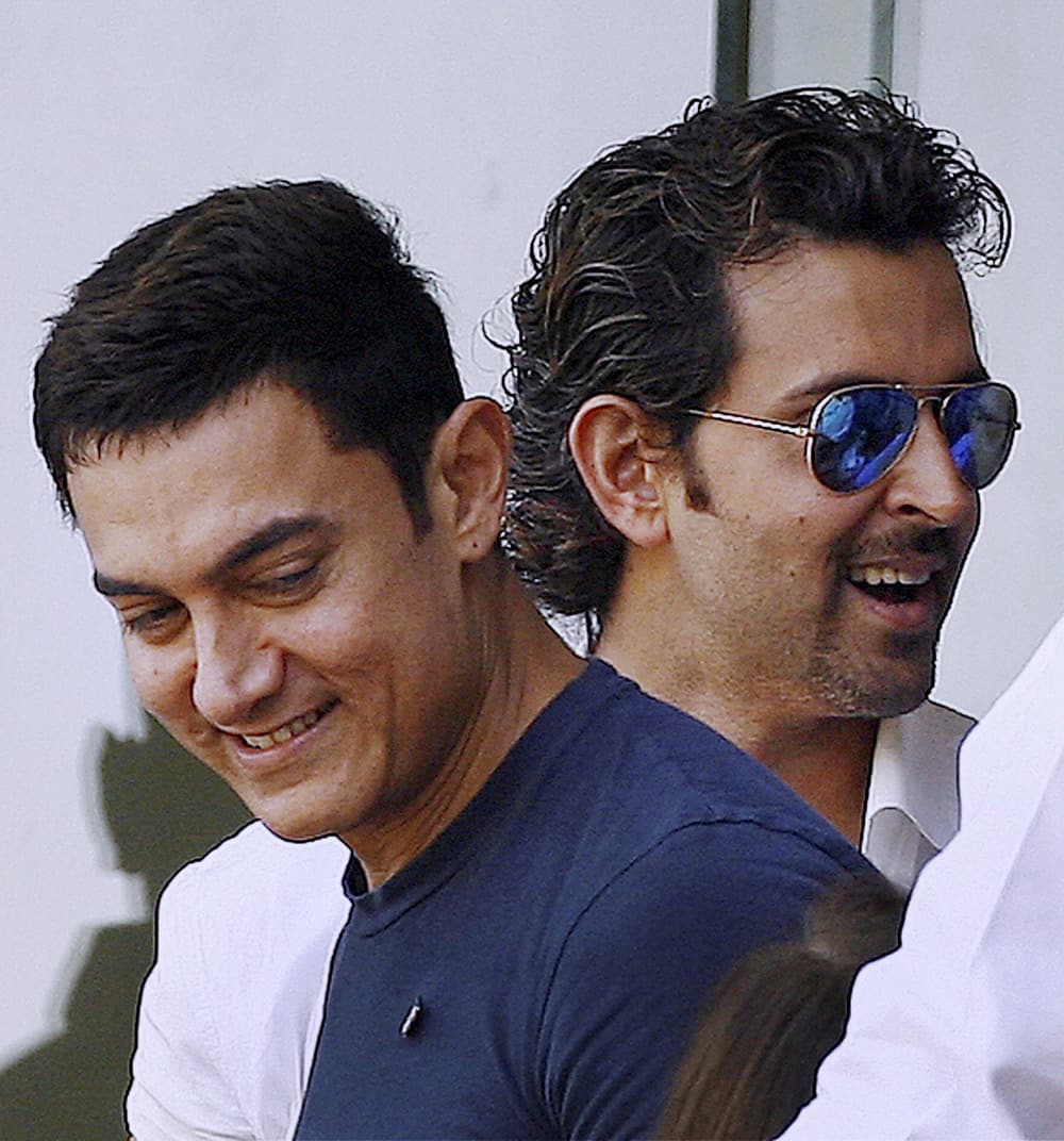 Aamir Khan and Hritik Roshan at Wankhede Stadium on Day 2 of the final Test match between India and West Indies in Mumbai.