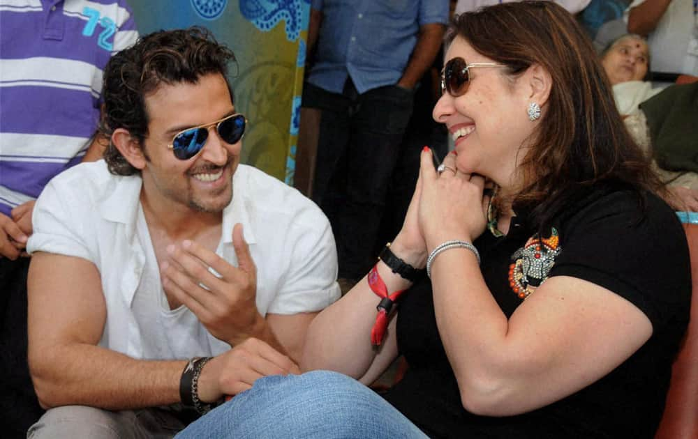 Hritik Roshan with Sachin Tendulkar's wife Anjali at Wankhede Stadium on Day 2 of the final Test match between India and West Indies in Mumbai.