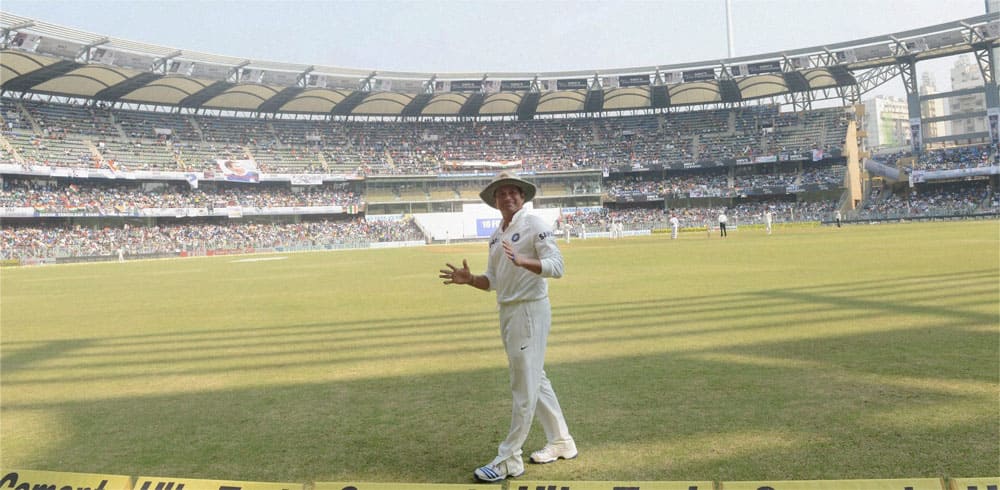 Master Blaster Sachin Tendulkar acknowledges the crowd during the 2nd test match against West Indies at Wankhede stadium in Mumbai.