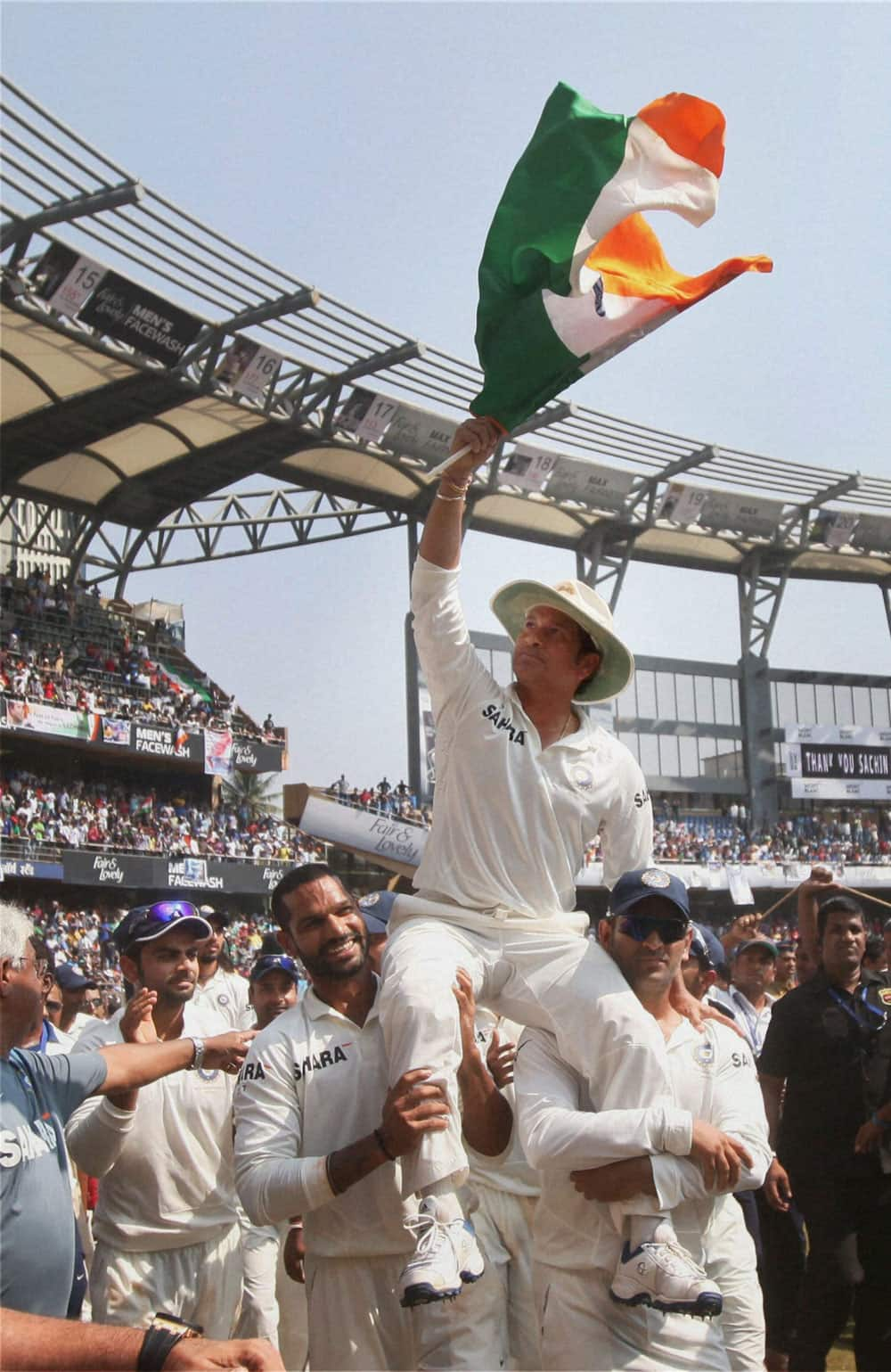 Sachin Tendulkar is given a farewell lap by his team mates as they carry him on his shoulders after he bid a tearful adieu to International Cricket at Wankhede Stadium in Mumbai.