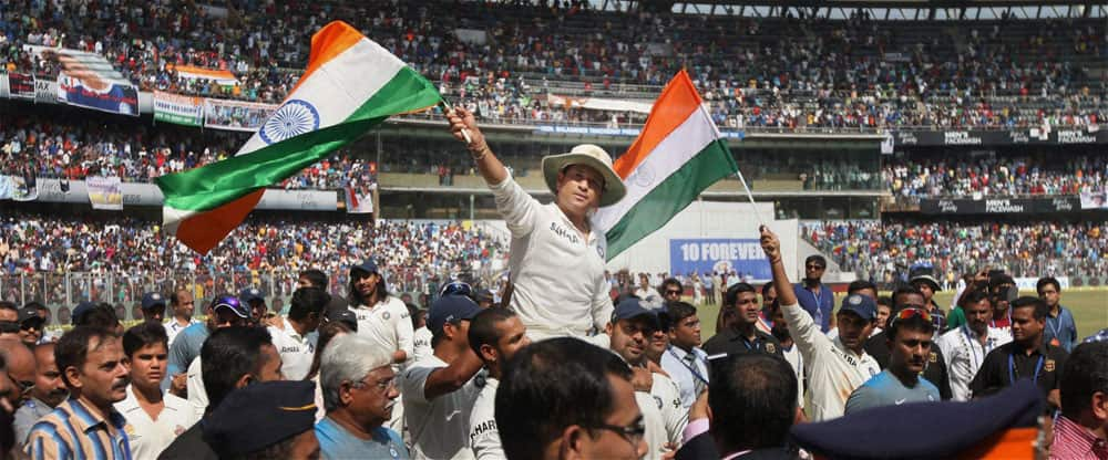 Sachin Tendulkar is given a farewell lap by his team mates as they carry him on his shoulders after he bid a tearful adieu to International Cricket at Wankhede Stadium in Mumbai.