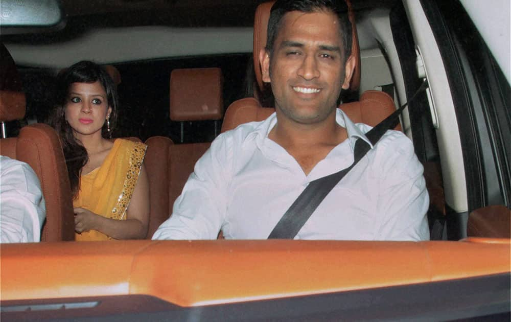 India captain MS Dhoni with wife Sakshi arrive for the farewell party hosted by Sachin and Anjali Tendulkar in Mumbai.