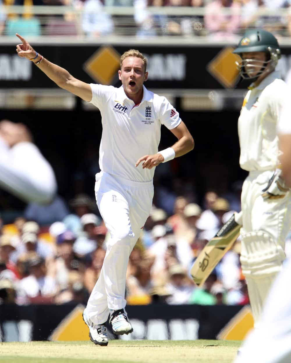 Stuart Broad celebrates after getting the wicket of Australia's Chris Roger on the first day of the series-opening Ashes test between England and Australia at the Gabba in Brisbane, Australia.