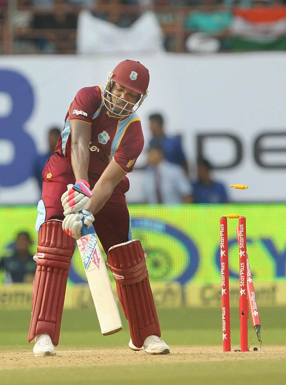 Darren Bravo of West Indies is castled by India's Shami Ahmed during the 1st ODI cricket match at Jawaharlal Nehru Stadium in Kochi.