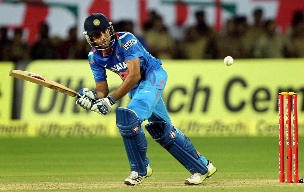 Rohit Sharma plays a shot against West Indies during the 1st ODI in Kochi.