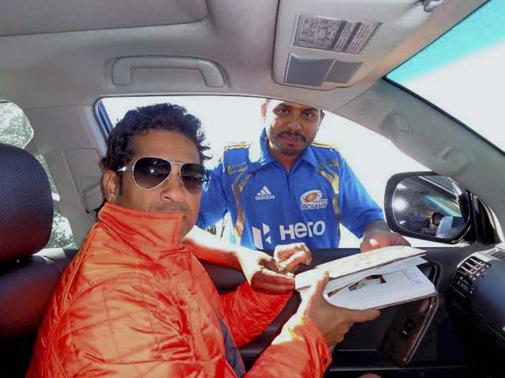 Sachin Tendulkar with a fan in Mussoorie.