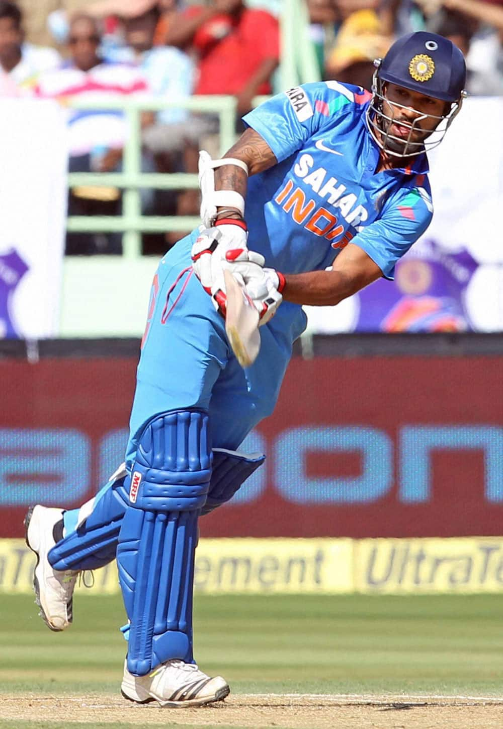 Indian Cricketer S Dhawan plays a shot during India vs West Indies 2nd ODI Match in Visakhapatnam.