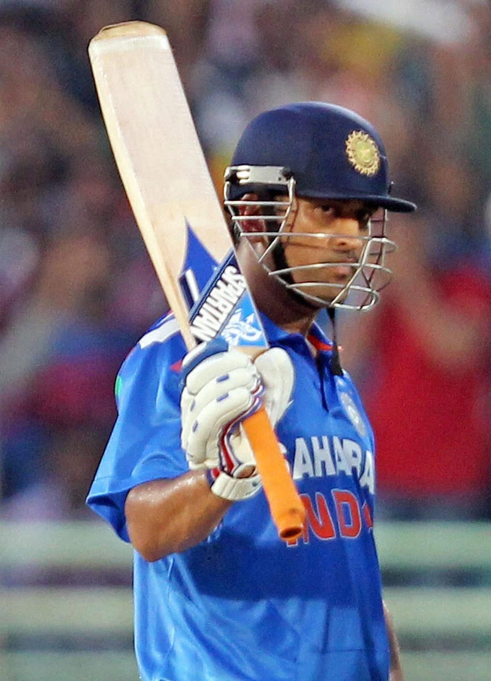 Captain M S Dhoni celebrates his half century during India vs West Indies 2nd ODI match in Visakhapatnam.