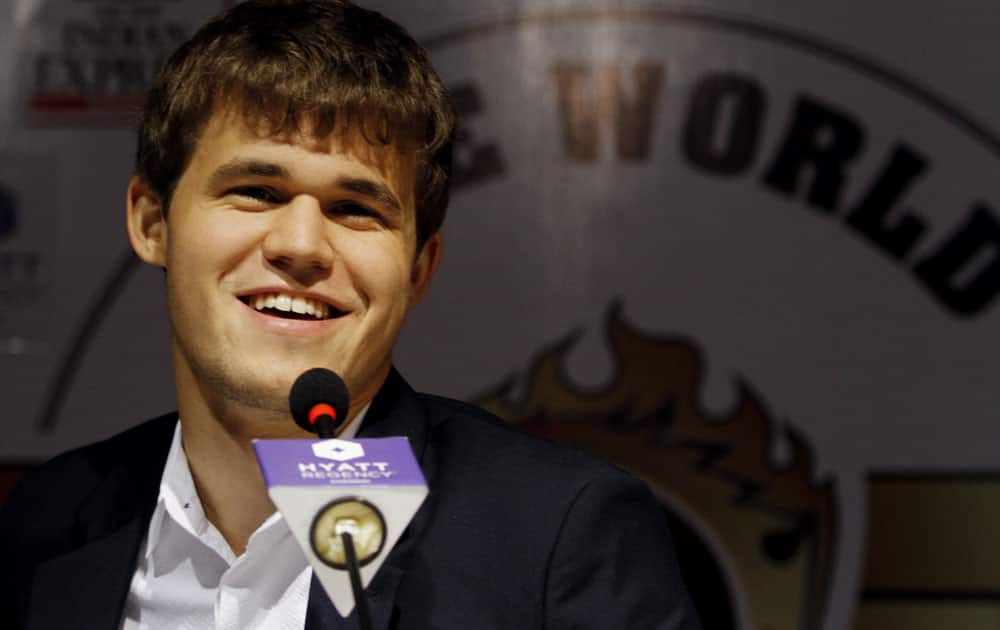 Norway’s Magnus Carlsen smiles as he answers a question during a press conference after winning the match against India’s Viswanathan Anand during the Chess World Championship match in Chennai.